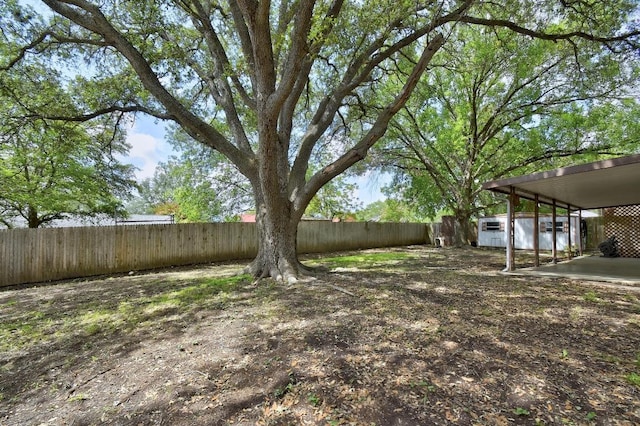 7546 Leafy Hollow Ct, Live Oak, TX 78233 - fenced backyard with a storage unit