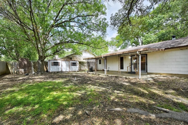 7546 Leafy Hollow Ct, Live Oak, TX 78233 - view of yard with a patio and a storage unit