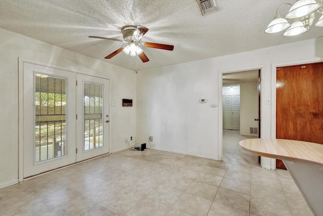 7546 Leafy Hollow Ct, Live Oak, TX 78233 - spare room featuring a ceiling fan, a textured ceiling, and light tile patterned flooring