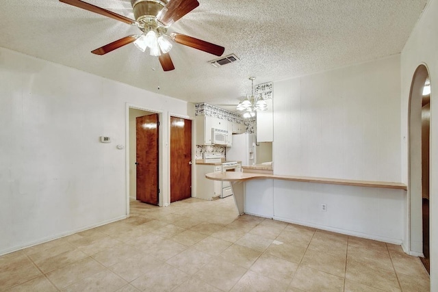 7546 Leafy Hollow Ct, Live Oak, TX 78233 - unfurnished room with a ceiling fan, a textured ceiling, arched walkways, and light tile patterned floors