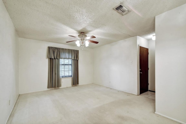 7546 Leafy Hollow Ct, Live Oak, TX 78233 - empty room featuring ceiling fan, carpet floors, and a textured ceiling