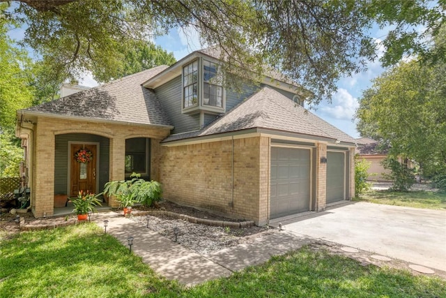 1912 Gaylord Dr, Austin, TX 78728 - view of front of home featuring brick siding, roof with shingles, and a chimney