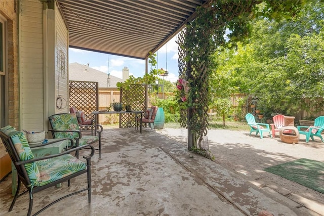 1912 Gaylord Dr, Austin, TX 78728 - view of patio featuring an outdoor fire pit