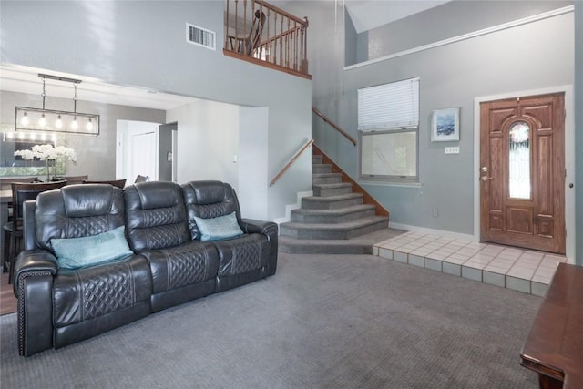 1912 Gaylord Dr, Austin, TX 78728 - carpeted living room with stairs and a high ceiling