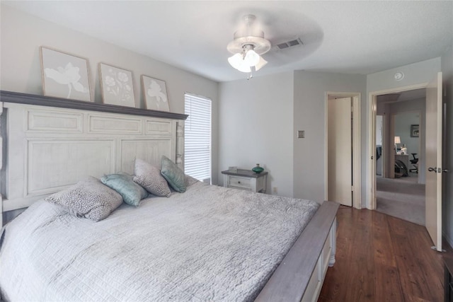 1912 Gaylord Dr, Austin, TX 78728 - bedroom featuring dark wood finished floors and a ceiling fan