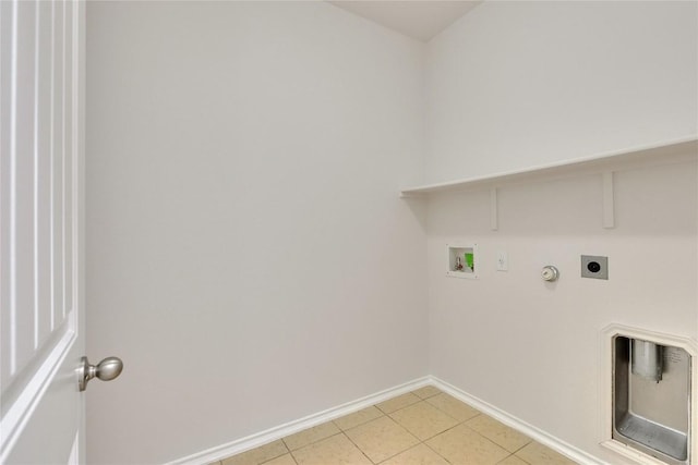 933 Oatmeal Dr, Pflugerville, TX 78660 - laundry room with washer hookup, gas dryer hookup, electric dryer hookup, and light tile patterned floors