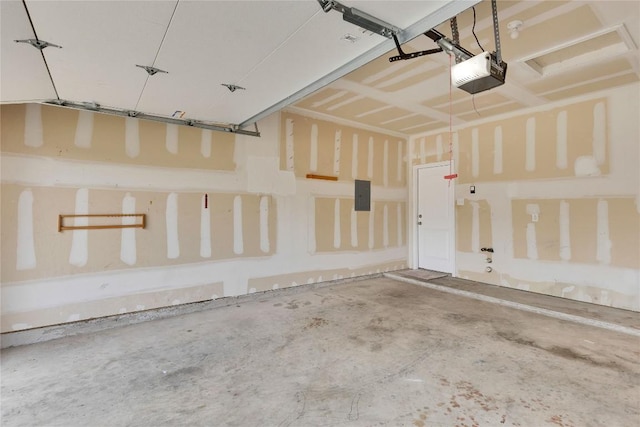 933 Oatmeal Dr, Pflugerville, TX 78660 - garage with a garage door opener and electric panel
