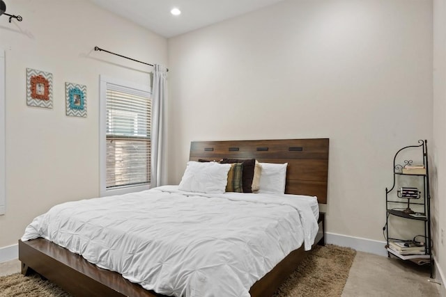 720 Pedernales St Unit B, Austin, TX 78702 - carpeted bedroom with baseboards and recessed lighting