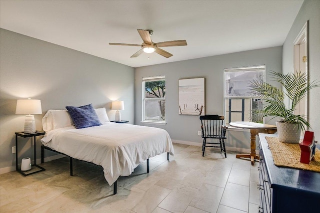215 Peaceful Haven Way, Hutto, TX 78634 - bedroom featuring baseboards and ceiling fan