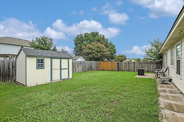 215 Peaceful Haven Way, Hutto, TX 78634 - fenced backyard featuring a storage shed