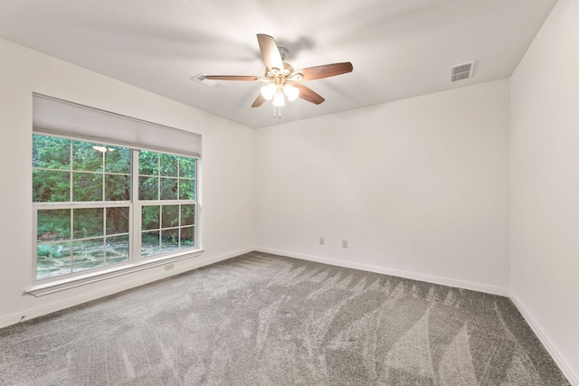 851 Stone Mountain Dr, Marble Falls, TX 78654 - unfurnished room featuring carpet and a ceiling fan