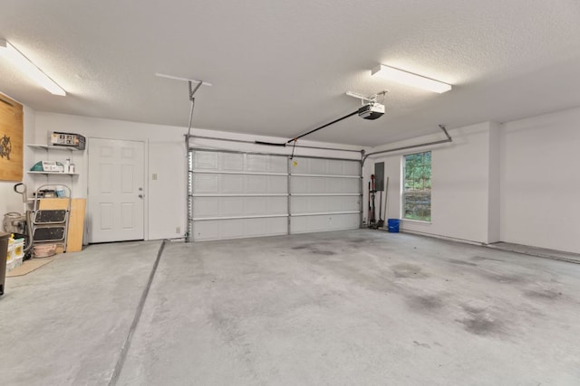 851 Stone Mountain Dr, Marble Falls, TX 78654 - garage featuring a garage door opener