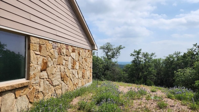 851 Stone Mountain Dr, Marble Falls, TX 78654 - view of home's exterior with stone siding