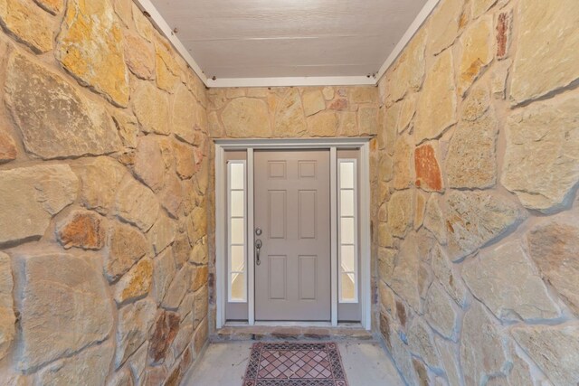 851 Stone Mountain Dr, Marble Falls, TX 78654 - doorway to property featuring stone siding