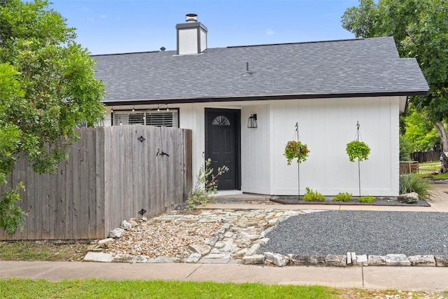 701 Mankato Dr, Austin, TX 78748 - view of front of house featuring a shingled roof and a chimney