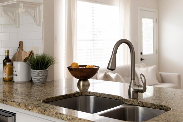 701 Mankato Dr, Austin, TX 78748 - kitchen view of light stone counters and tasteful backsplash