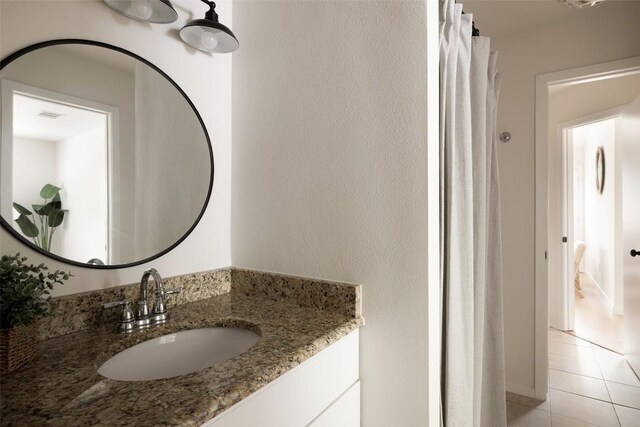 701 Mankato Dr, Austin, TX 78748 - full bath featuring vanity and tile patterned floors