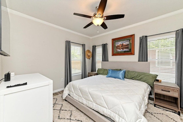 7312 Meador Ave, Austin, TX 78752 - bedroom featuring ornamental molding, light wood-style flooring, and ceiling fan