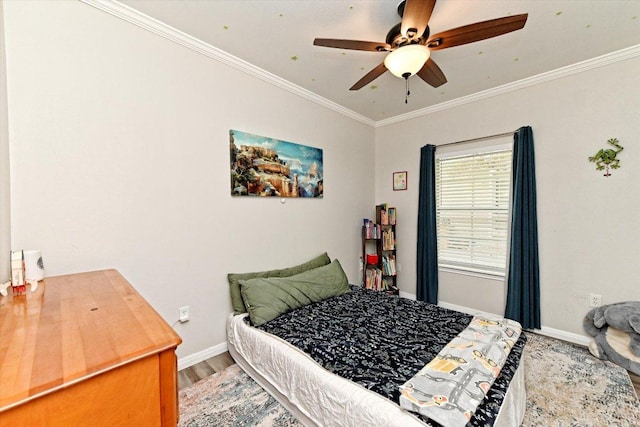 7312 Meador Ave, Austin, TX 78752 - bedroom featuring crown molding, wood finished floors, and a ceiling fan