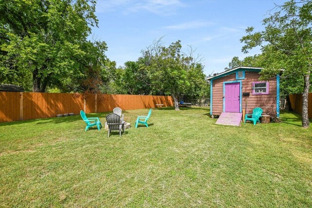 7312 Meador Ave, Austin, TX 78752 - fenced backyard featuring an outdoor structure