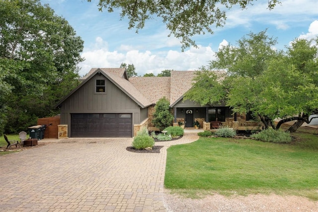 79 Saddle Rock Rdg, Wimberley, TX 78676 - view of front of property with driveway, a porch, stone siding, and a front yard