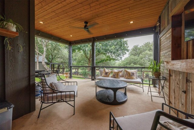 79 Saddle Rock Rdg, Wimberley, TX 78676 - sunroom / solarium with a ceiling fan, an outdoor living space, and plenty of natural light