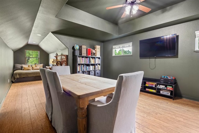 79 Saddle Rock Rdg, Wimberley, TX 78676 - dining space featuring wood-type flooring, vaulted ceiling, ceiling fan, and plenty of natural light