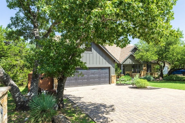 79 Saddle Rock Rdg, Wimberley, TX 78676 - view of front of house featuring board and batten siding and decorative driveway