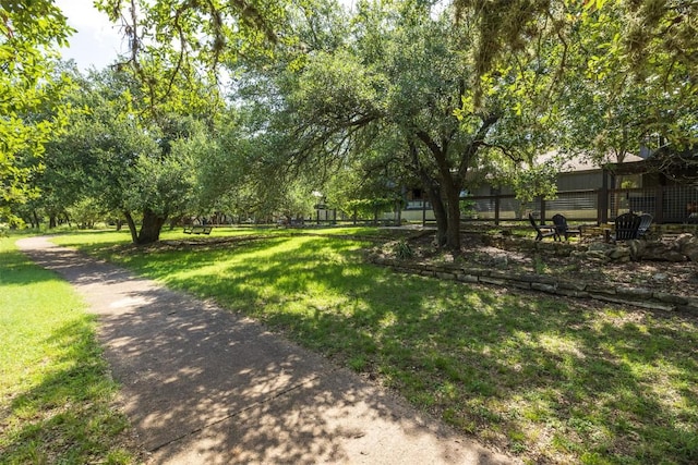 79 Saddle Rock Rdg, Wimberley, TX 78676 - surrounding community with a lawn and driveway