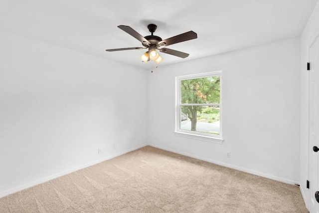 10504 Grand Oak Cir, Austin, TX 78750 - carpeted spare room with ceiling fan and baseboards