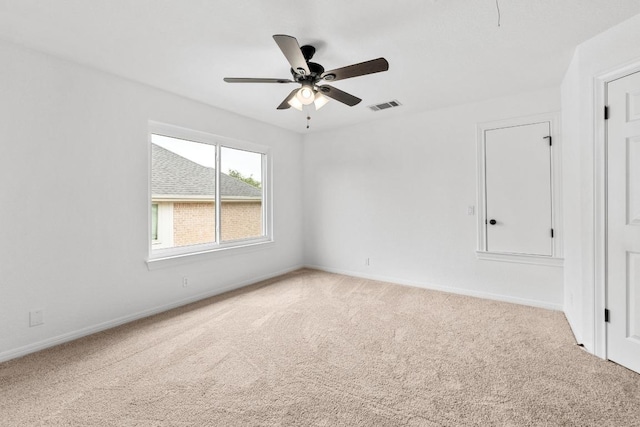 10504 Grand Oak Cir, Austin, TX 78750 - spare room with carpet and a ceiling fan