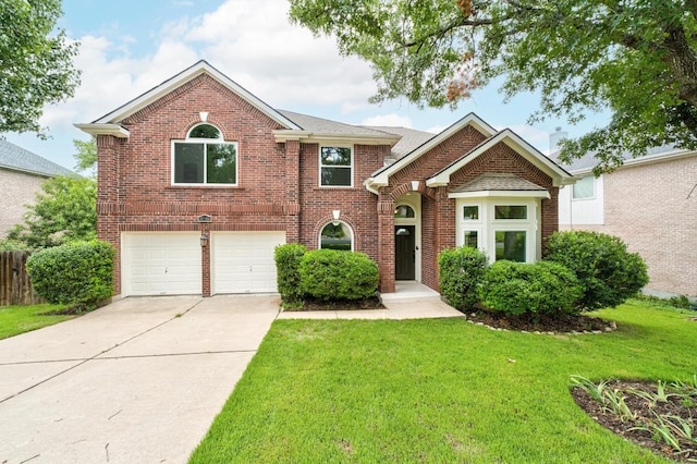 10504 Grand Oak Cir, Austin, TX 78750 - view of front facade featuring a front yard, an attached garage, concrete driveway, and brick siding