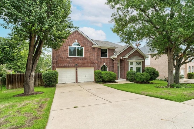 10504 Grand Oak Cir, Austin, TX 78750 - view of front of home featuring brick siding, an attached garage, and driveway
