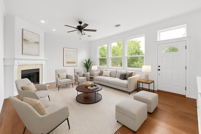 10504 Grand Oak Cir, Austin, TX 78750 - living area with a ceiling fan, recessed lighting, wood finished floors, and a fireplace