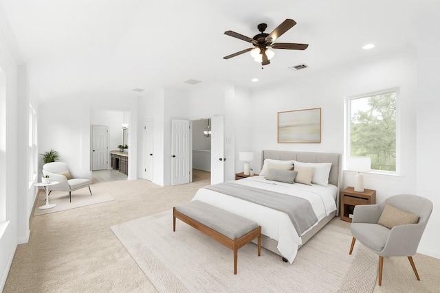 10504 Grand Oak Cir, Austin, TX 78750 - bedroom with light colored carpet, recessed lighting, ensuite bathroom, ceiling fan, and a spacious closet