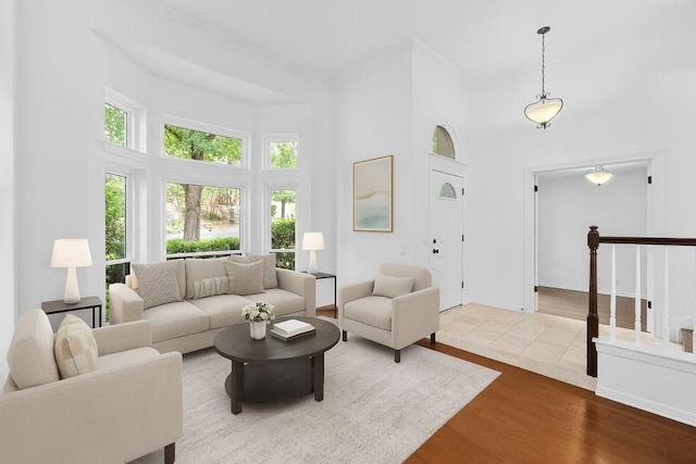 10504 Grand Oak Cir, Austin, TX 78750 - living area with a towering ceiling and wood finished floors