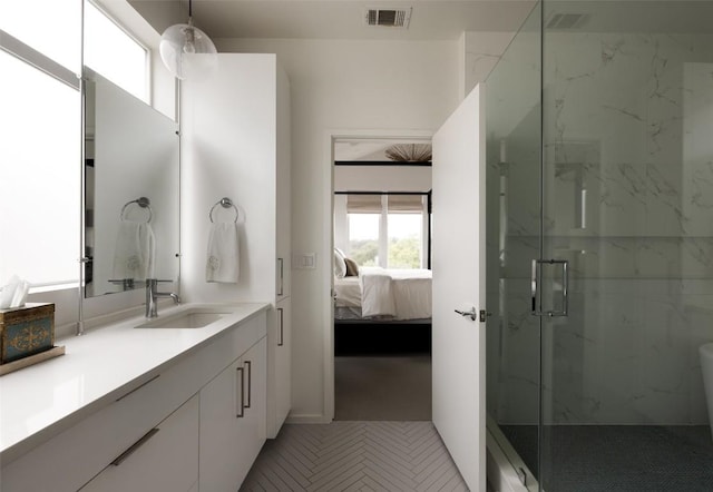 3100 Menchaca Rd Unit 10, Austin, TX 78704 - bathroom with vanity, a marble finish shower, and connected bathroom