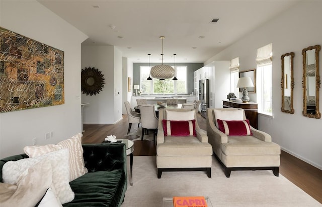 3100 Menchaca Rd Unit 10, Austin, TX 78704 - living room with plenty of natural light and wood finished floors