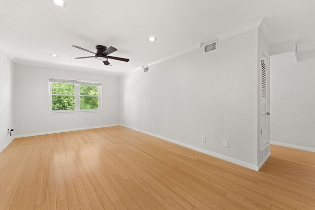 900 S Lamar Blvd Unit 304, Austin, TX 78704 - spare room featuring ornamental molding, a ceiling fan, recessed lighting, and light wood-style flooring