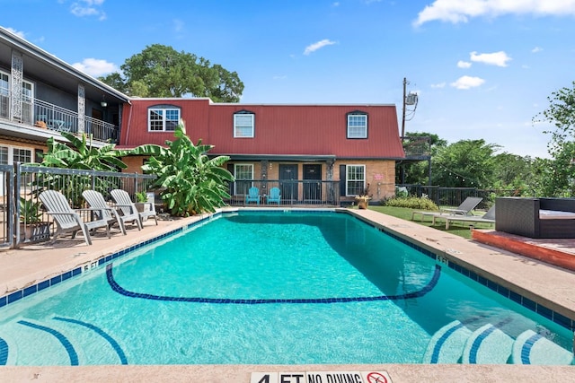 900 S Lamar Blvd Unit 304, Austin, TX 78704 - community pool featuring a patio area