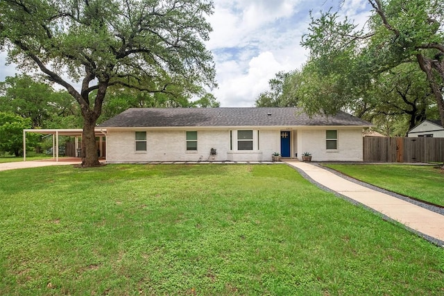 13516 Caldwell Dr, Austin, TX 78750 - ranch-style house with brick siding, a carport, and concrete driveway