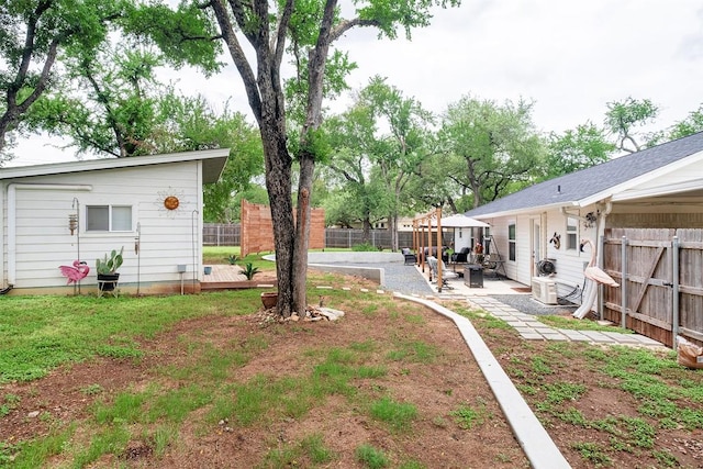 13516 Caldwell Dr, Austin, TX 78750 - fenced backyard with a patio and an outbuilding