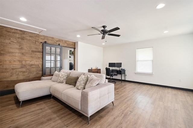 13516 Caldwell Dr, Austin, TX 78750 - living area with attic access, recessed lighting, a ceiling fan, wood finished floors, and washer / clothes dryer