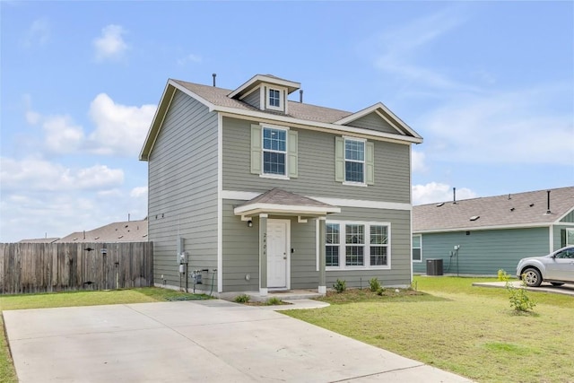 2406 Windrow Ln, Lockhart, TX 78644 - traditional-style house featuring a patio area