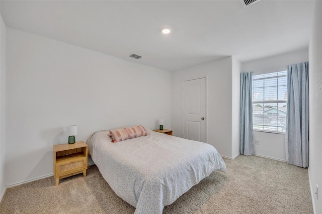 2406 Windrow Ln, Lockhart, TX 78644 - bedroom featuring light carpet and recessed lighting