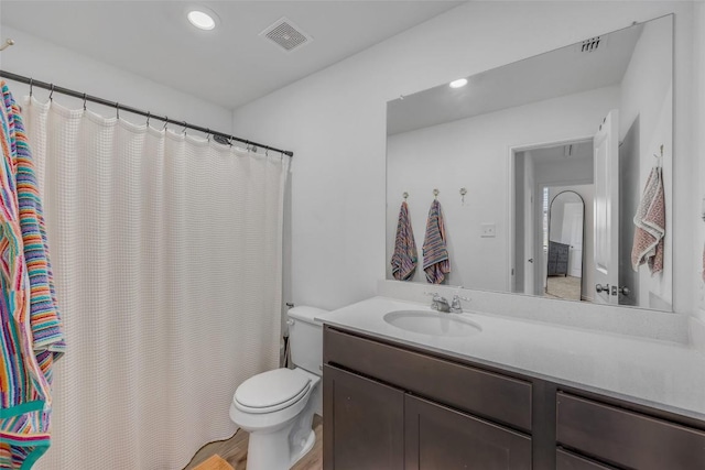 2406 Windrow Ln, Lockhart, TX 78644 - bathroom featuring vanity, curtained shower, and recessed lighting