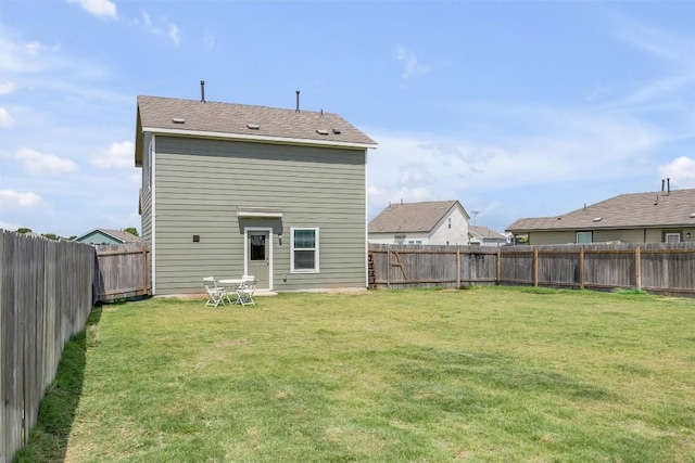 2406 Windrow Ln, Lockhart, TX 78644 - rear view of property with a fenced backyard