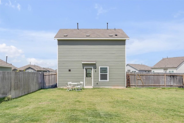2406 Windrow Ln, Lockhart, TX 78644 - back of house with a fenced backyard