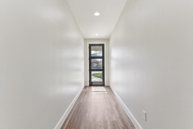 130 Mokalau Dr, Bastrop, TX 78602 - entryway featuring light wood-style flooring and recessed lighting