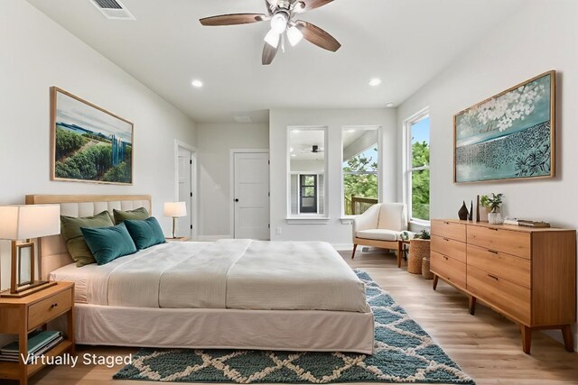 130 Mokalau Dr, Bastrop, TX 78602 - bedroom featuring light wood finished floors, recessed lighting, and a ceiling fan